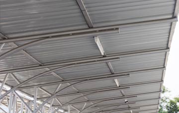 installing Spott metal roofing