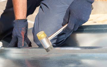 Spott metal flat roofing repairs