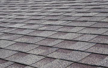 Spott tiles for shallow pitch roofing